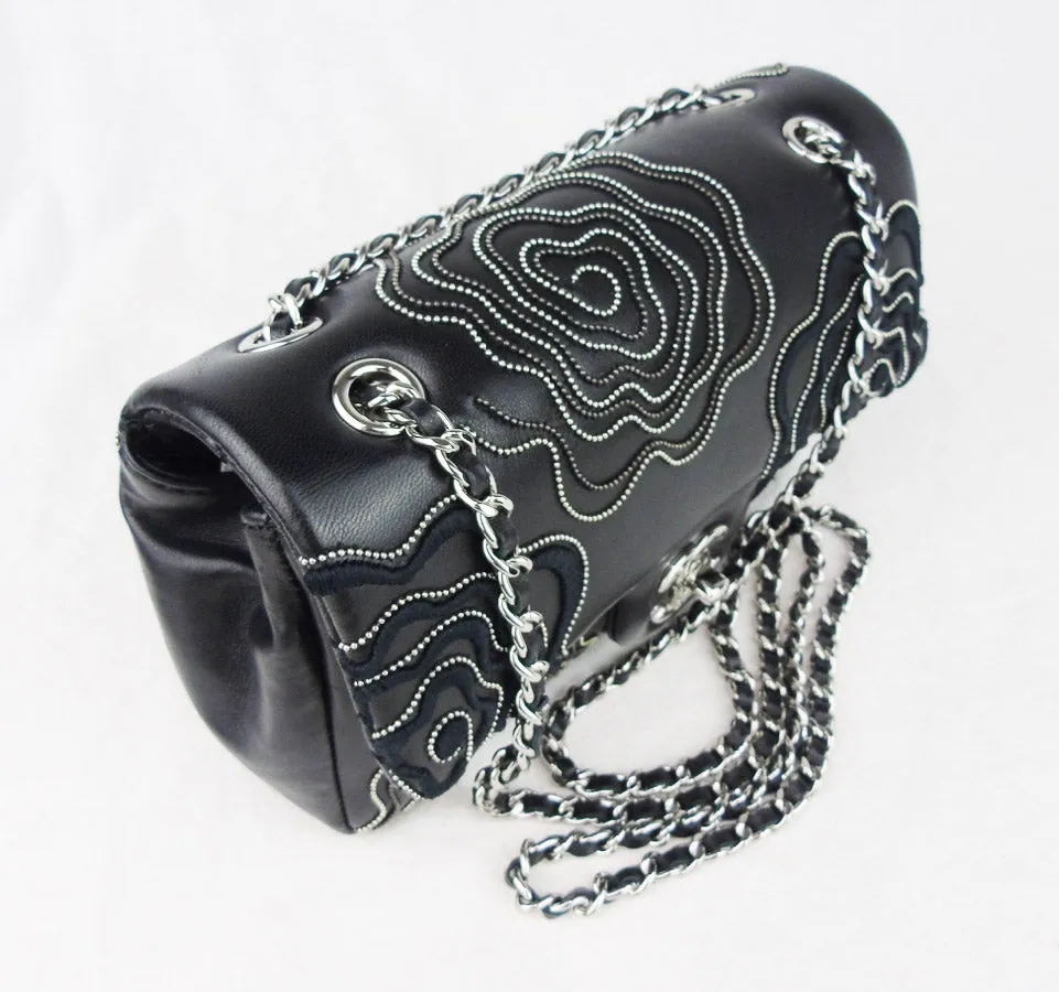 CHANEL 'Follies' black flap bag